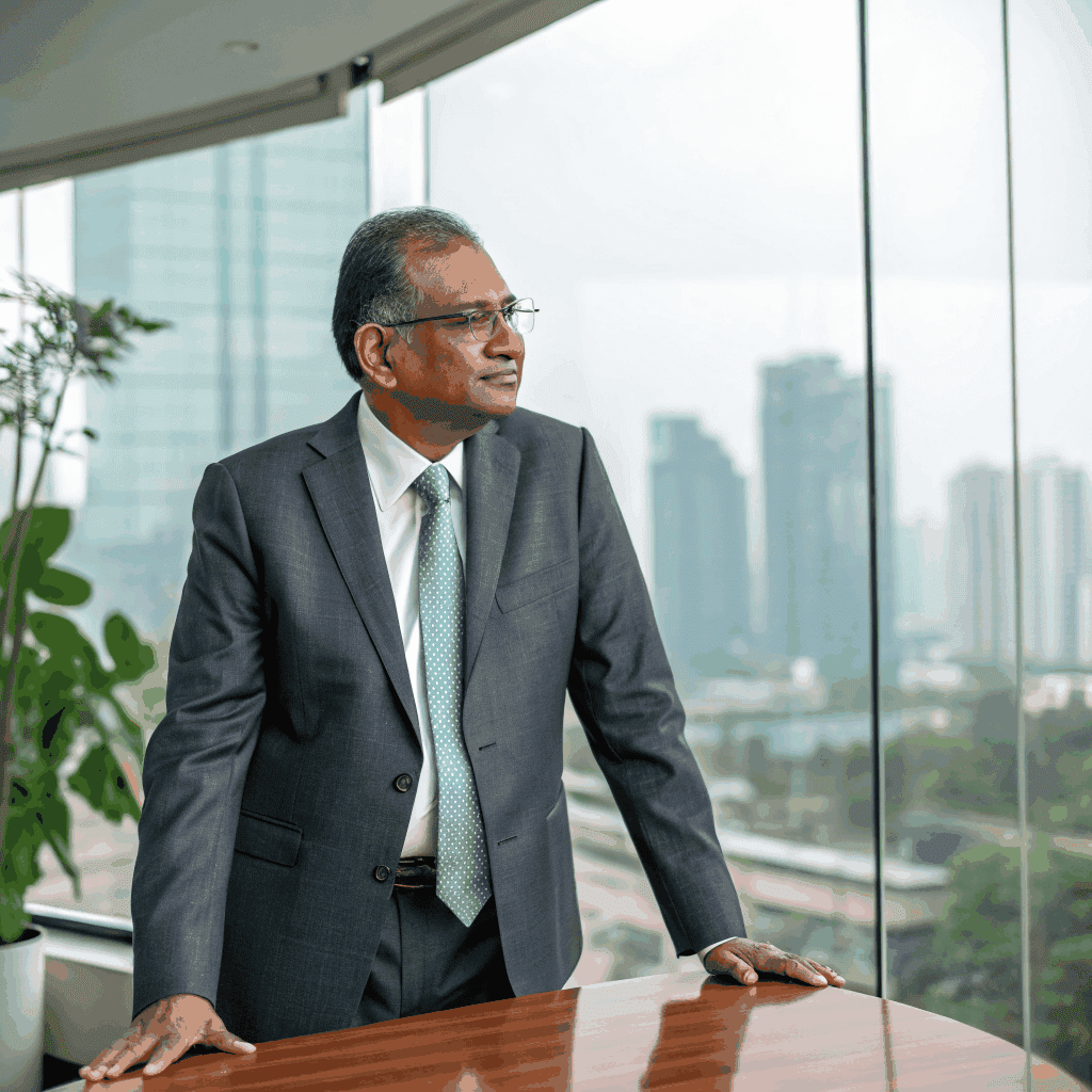 Sunil Singh analyzing hotel revenue data on multiple screens